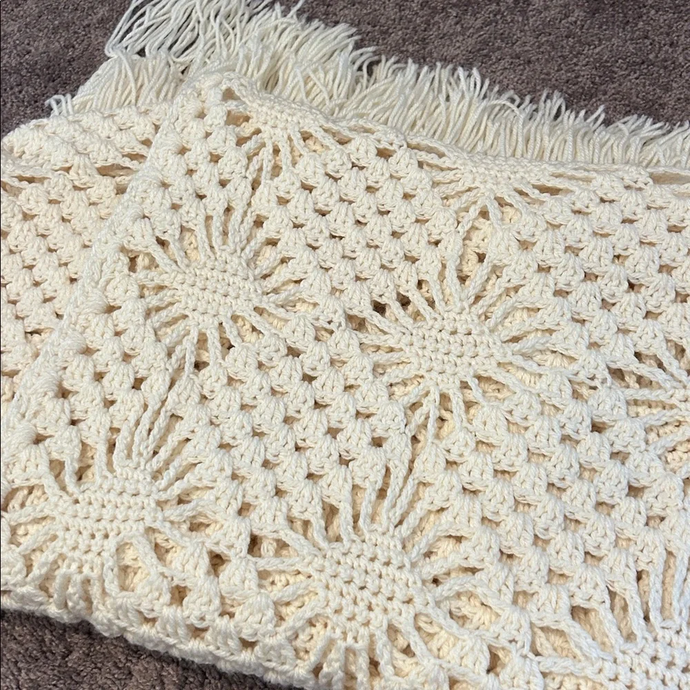 Primitive farmhouse style Peacock Alley white crocheted floral fringed blanket